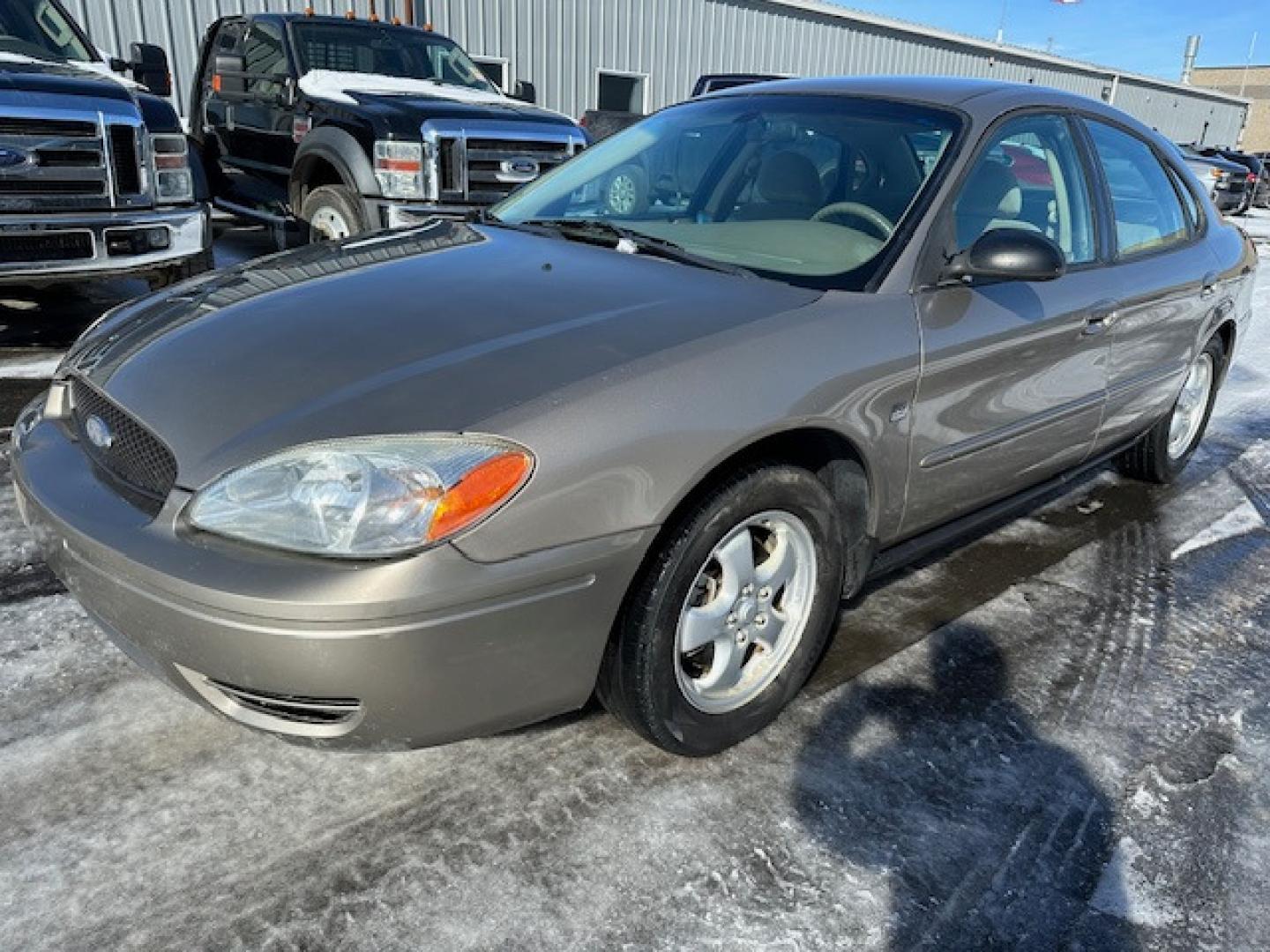 2004 Gold /Beige Ford Taurus (1FAFP55S74G) , Automatic transmission, located at 3200 1st Avenue North, Billings, MT, 59101, (406) 245-9055, 45.779270, -108.510742 - Low Mileage Local Trade-In. Well Maintained, Power Seat, Power Windows, Power Door Locks, Tilt Steering, Duratec Engine and Much More! CarFax Dealer. Auto Brokers of Montana/AA&A Auto Rental/Fox Car Rental Billings - Photo#1